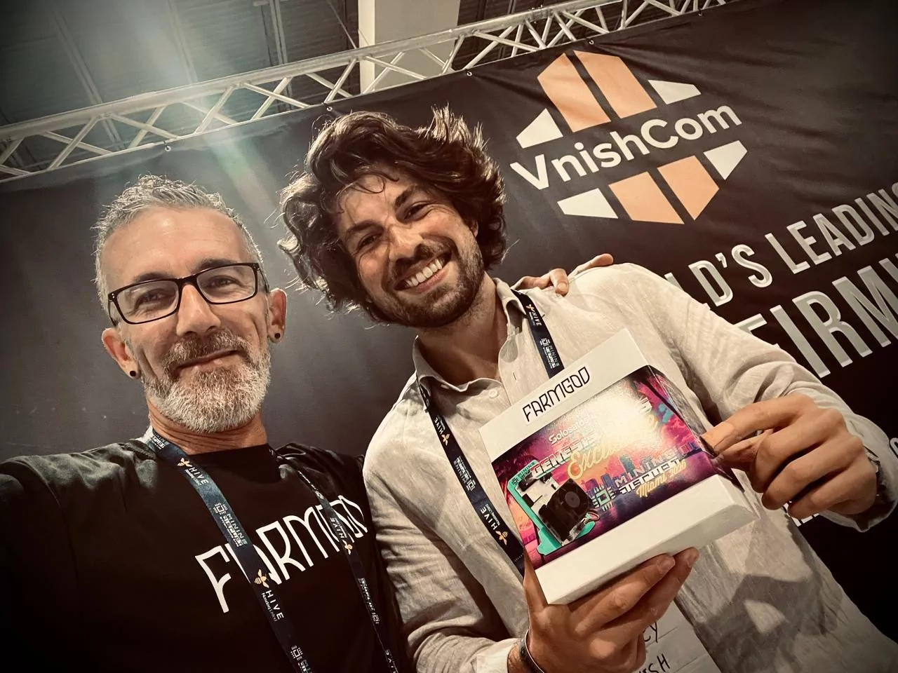 At the VNish booth, with a Mining Disrupt special edition